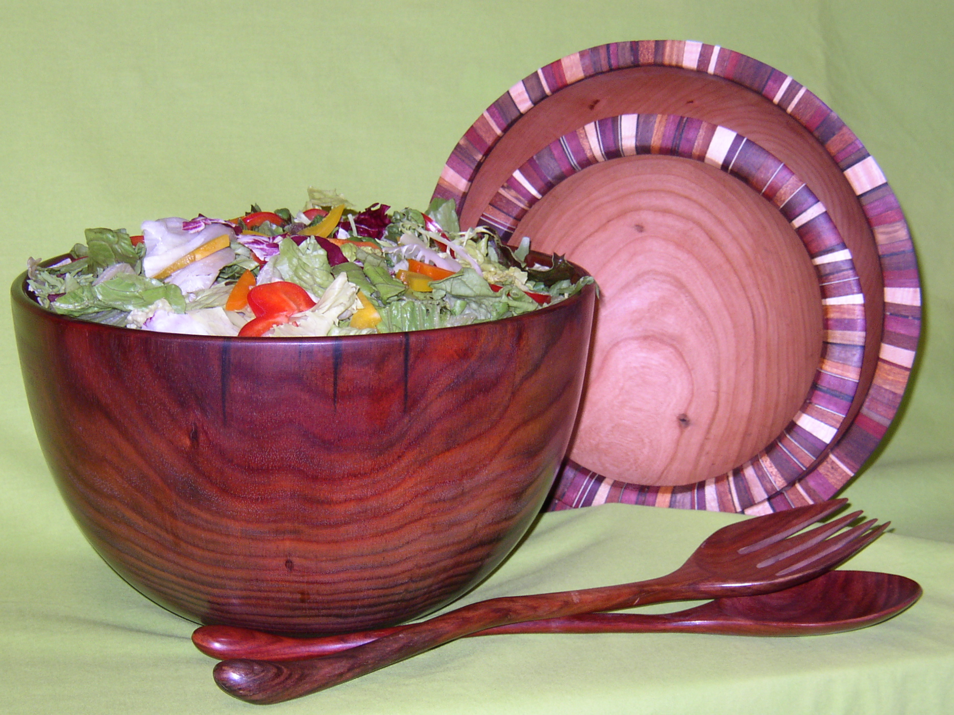 Rosewood and uniquely hand crafted salad bowls and servers.